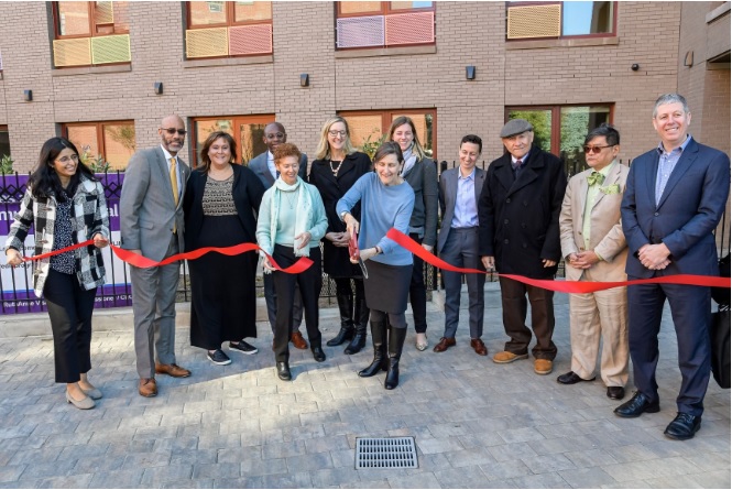 Carol Corden cuts the ribbon