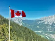 flag of Canada in the mountains