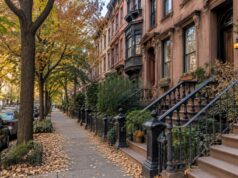 Buying a Brooklyn Brownstone or Co-op? A Renovation Reality Check Before You Close row of brownstone townhouses on a Park Slope Brooklyn street in autumn
