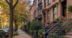Buying a Brooklyn Brownstone or Co-op? A Renovation Reality Check Before You Close row of brownstone townhouses on a Park Slope Brooklyn street in autumn